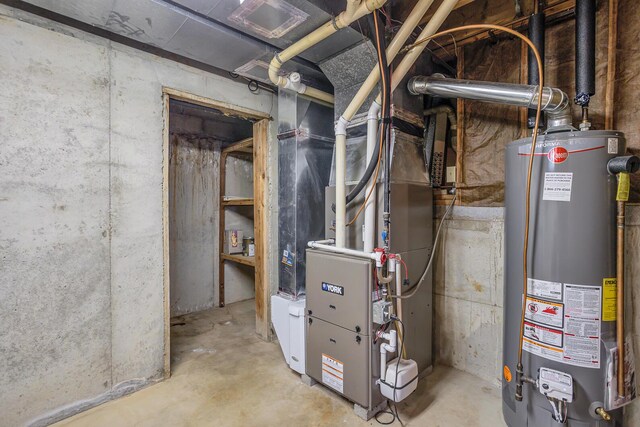 190 Steves Scenic Dr, Horton, MI 49246 - utility room featuring gas water heater and heating unit