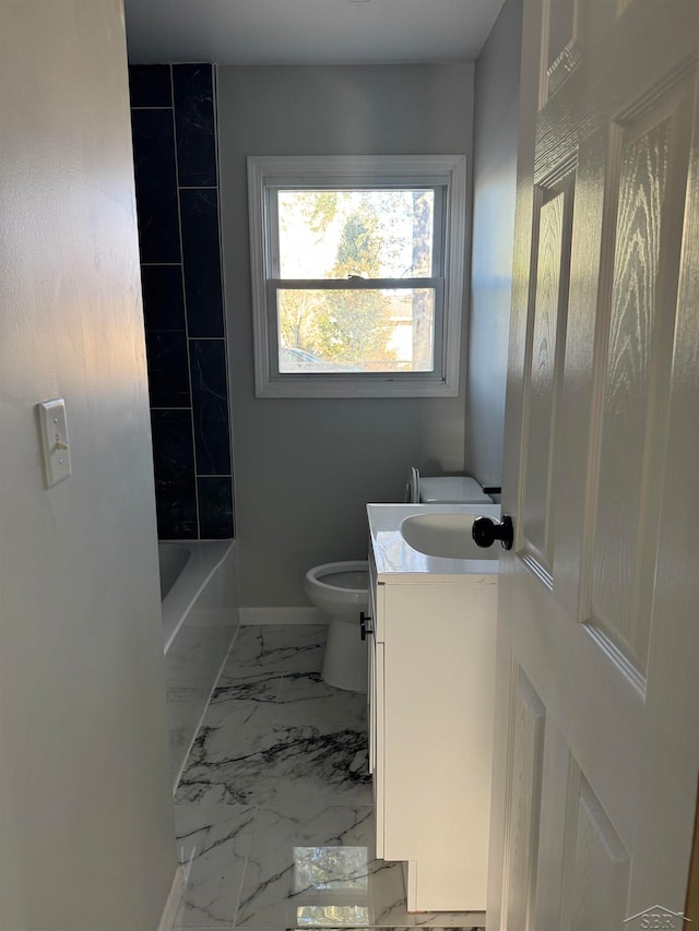 full bathroom featuring vanity, toilet, and washtub / shower combination