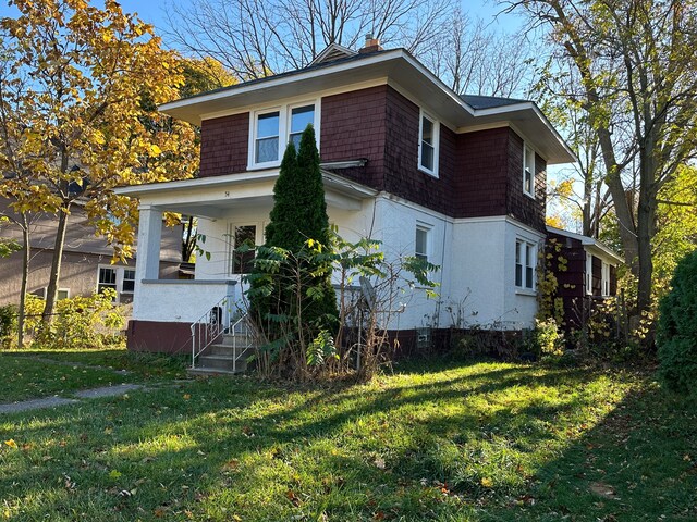 54 Nelson St, Pontiac, MI 48342 - view of home's exterior featuring a yard