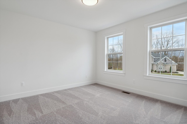 view of carpeted spare room