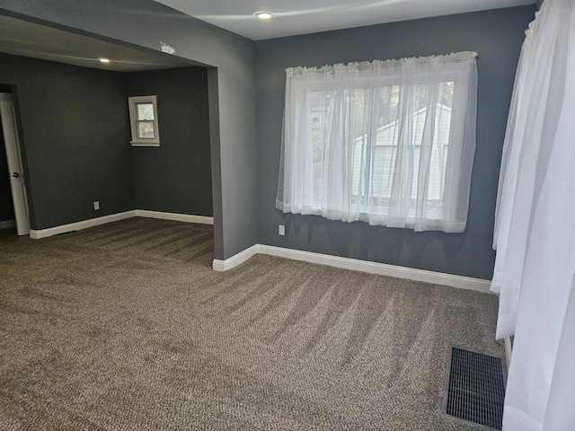 view of carpeted spare room