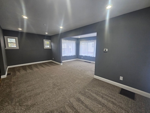 view of carpeted spare room