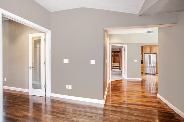 16460 15 Mile Rd, Marshall, MI 49068 - empty room with wood finished floors, lofted ceiling, and stairway