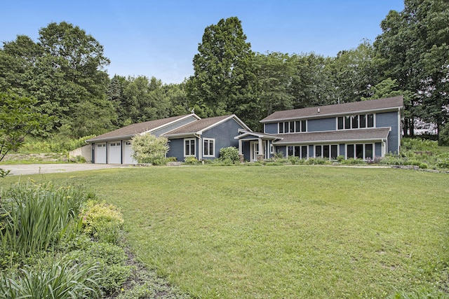 16460 15 Mile Rd, Marshall, MI 49068 - view of front of property with an attached garage, a front yard, and concrete driveway