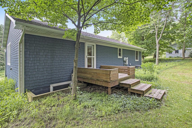 16460 15 Mile Rd, Marshall, MI 49068 - back of house featuring a wooden deck and a lawn