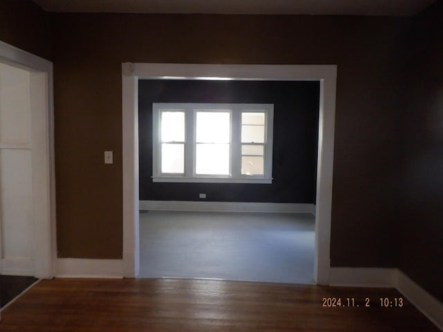 124 W Maple St, Kalamazoo, MI 49001 - spare room with wood finished floors and baseboards