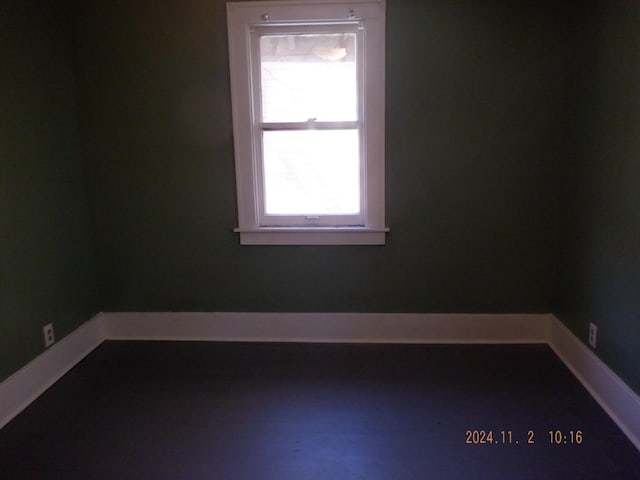 124 W Maple St, Kalamazoo, MI 49001 - spare room featuring baseboards