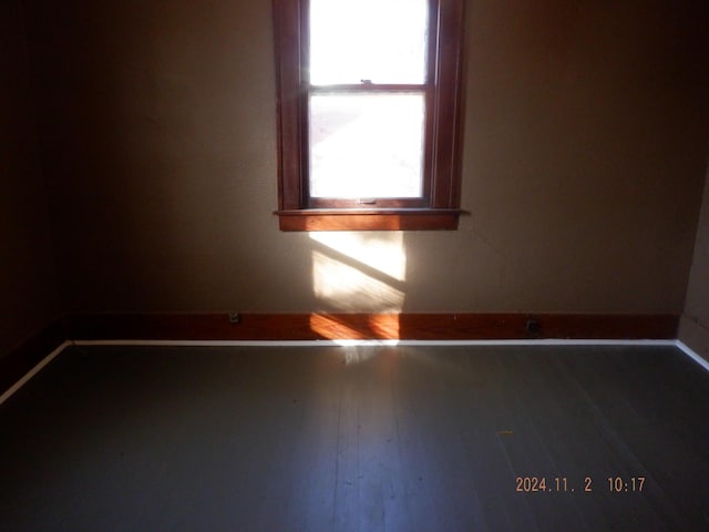 124 W Maple St, Kalamazoo, MI 49001 - empty room with baseboards and wood finished floors