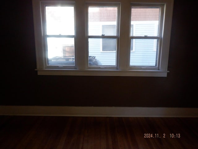 124 W Maple St, Kalamazoo, MI 49001 - spare room featuring plenty of natural light and wood finished floors