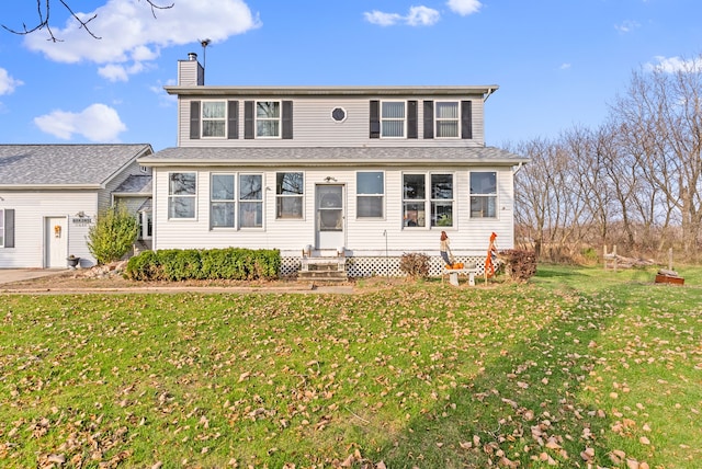 view of front of property featuring a front lawn