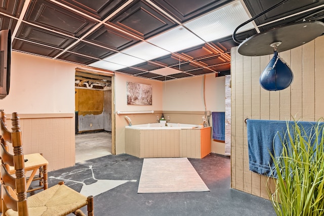 bathroom with concrete flooring