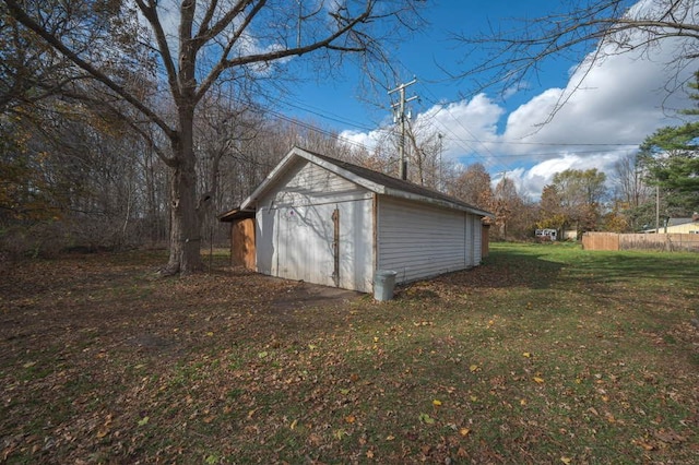 view of outdoor structure with a lawn