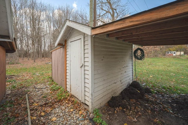 view of outdoor structure with a yard