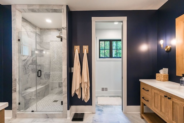 bathroom featuring vanity and walk in shower