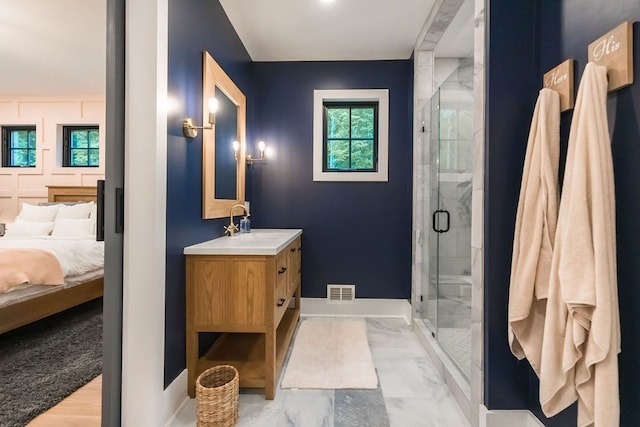 bathroom featuring vanity, hardwood / wood-style flooring, and walk in shower