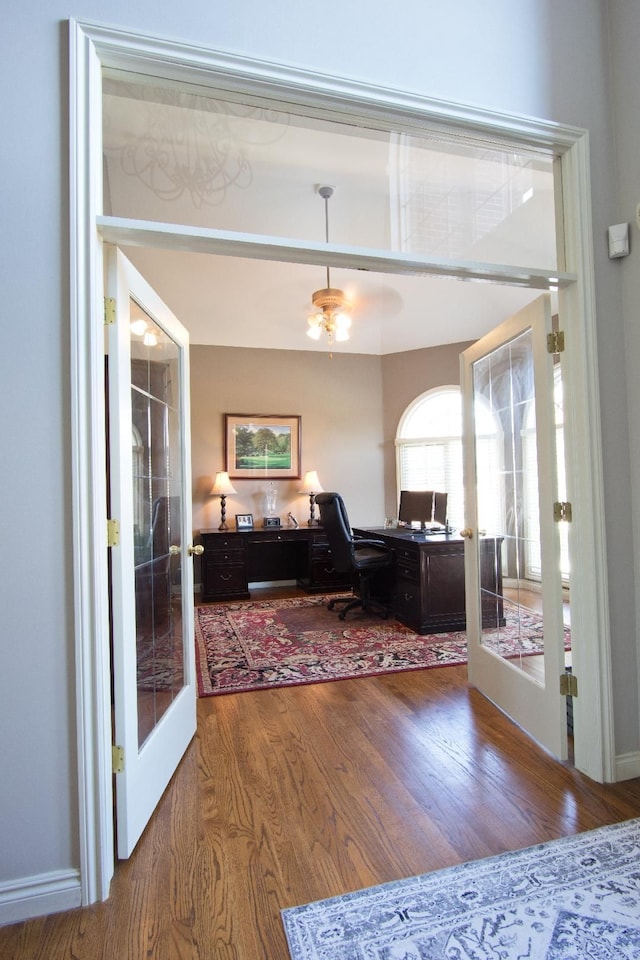 dining space featuring french doors and hardwood / wood-style flooring