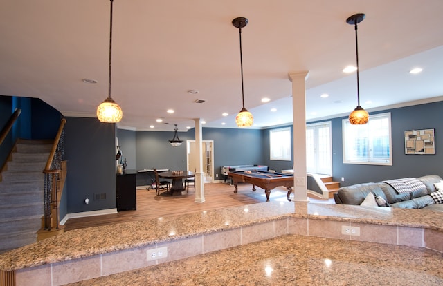 recreation room featuring hardwood / wood-style floors, crown molding, and billiards