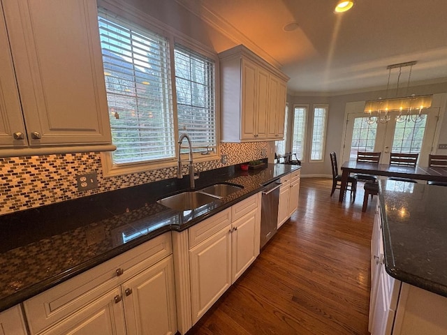 755 Majestic, Rochester Hills, MI 48306 - kitchen with ornamental molding, dark wood-type flooring, tasteful backsplash, a sink, and dishwasher