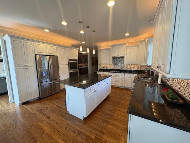 755 Majestic, Rochester Hills, MI 48306 - kitchen with appliances with stainless steel finishes, a sink, white cabinetry, dark wood-type flooring, and a kitchen island