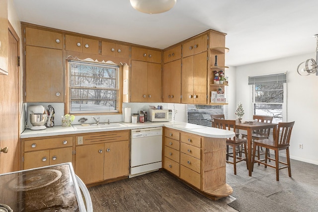 2399 S Cleveland Ave, Saint Joseph, MI 49085 - kitchen with white appliances, a peninsula, open shelves, and light countertops