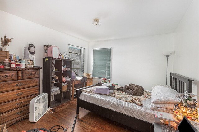 2399 S Cleveland Ave, Saint Joseph, MI 49085 - bedroom featuring dark wood-style flooring