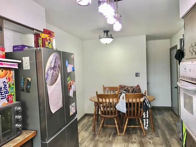 dining room featuring dark hardwood / wood-style floors