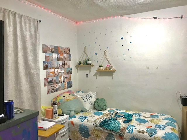 bedroom with a textured ceiling