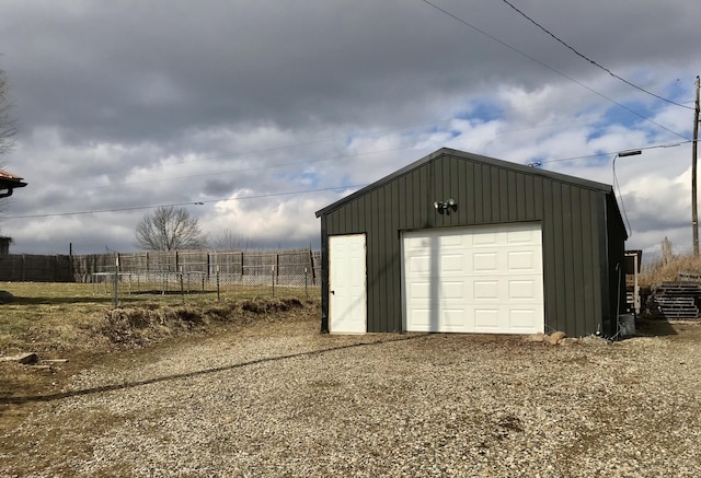 detached garage with fence