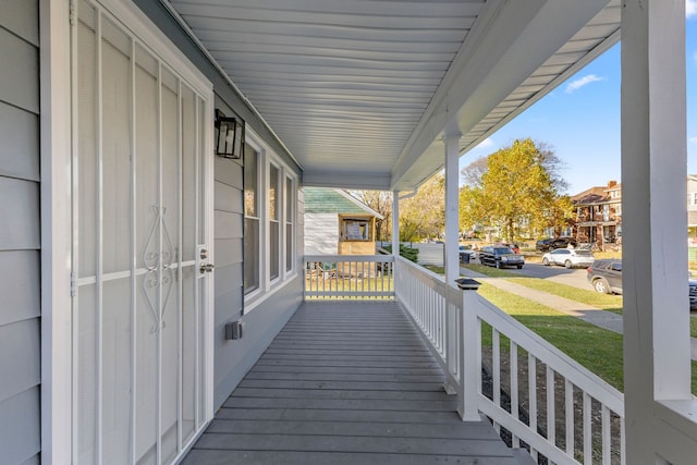 wooden deck featuring a porch