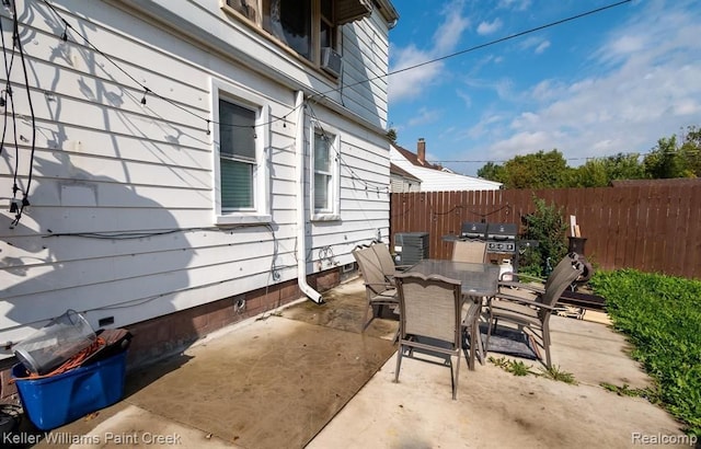 view of patio with a grill