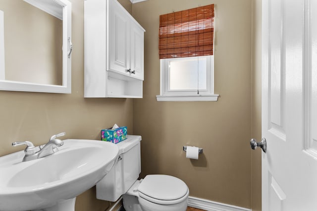 bathroom with sink and toilet