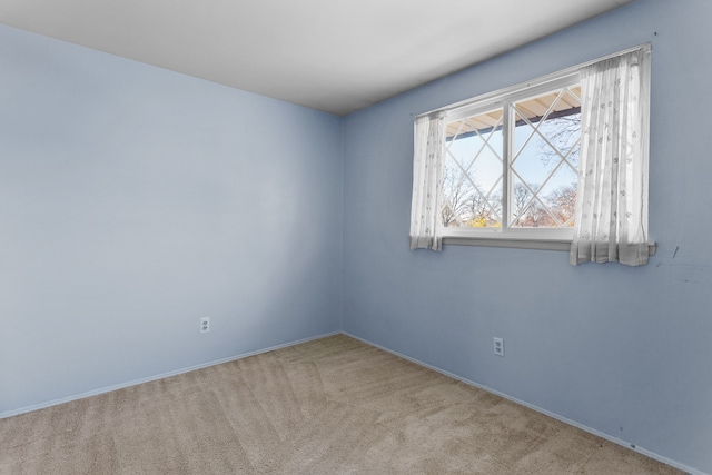 view of carpeted spare room