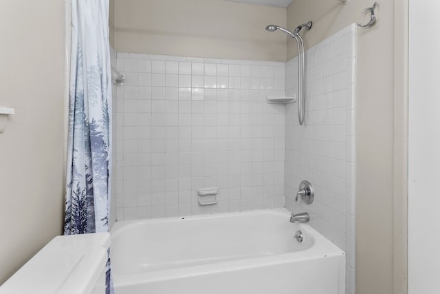 bathroom with shower / bath combination with curtain