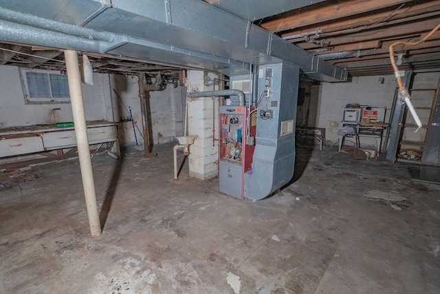 basement featuring heating unit