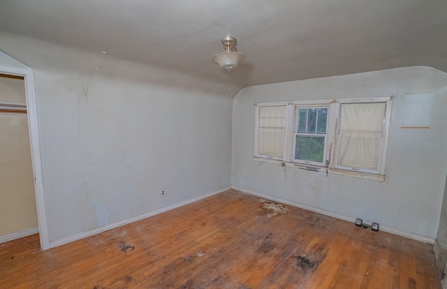 spare room featuring hardwood / wood-style flooring