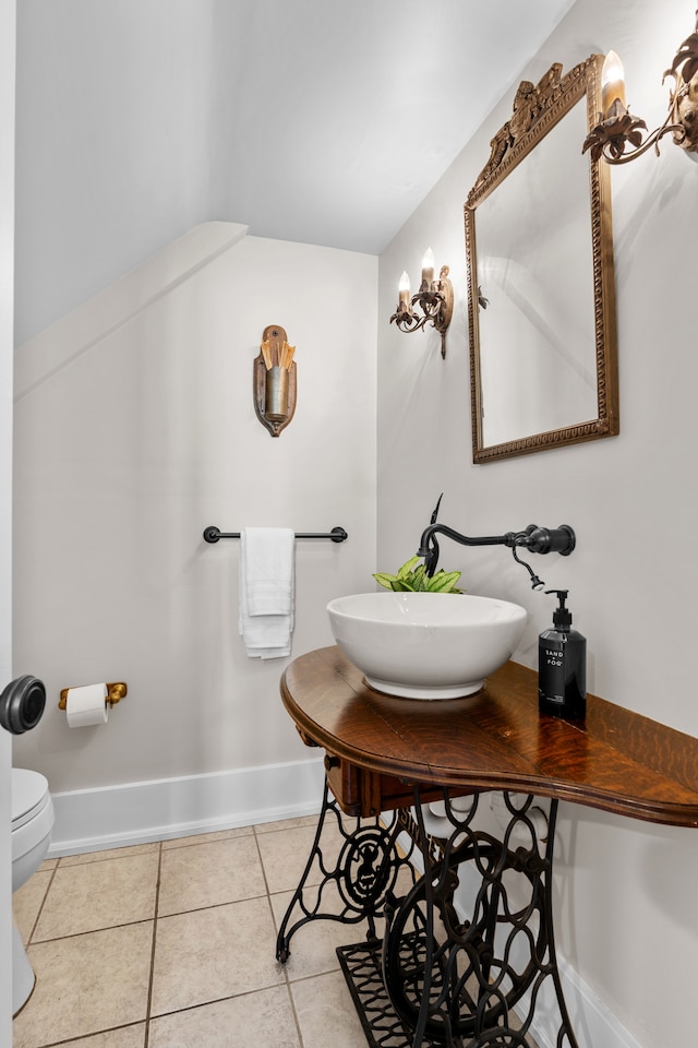 bathroom featuring tile patterned floors, sink, and toilet