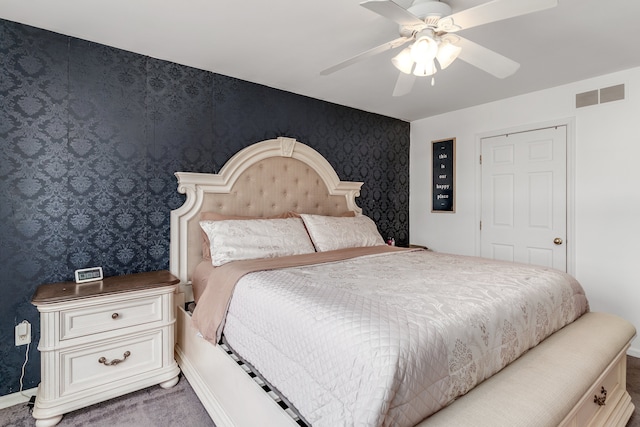 carpeted bedroom featuring ceiling fan