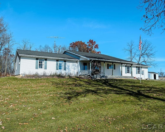 ranch-style home with a porch and a front lawn