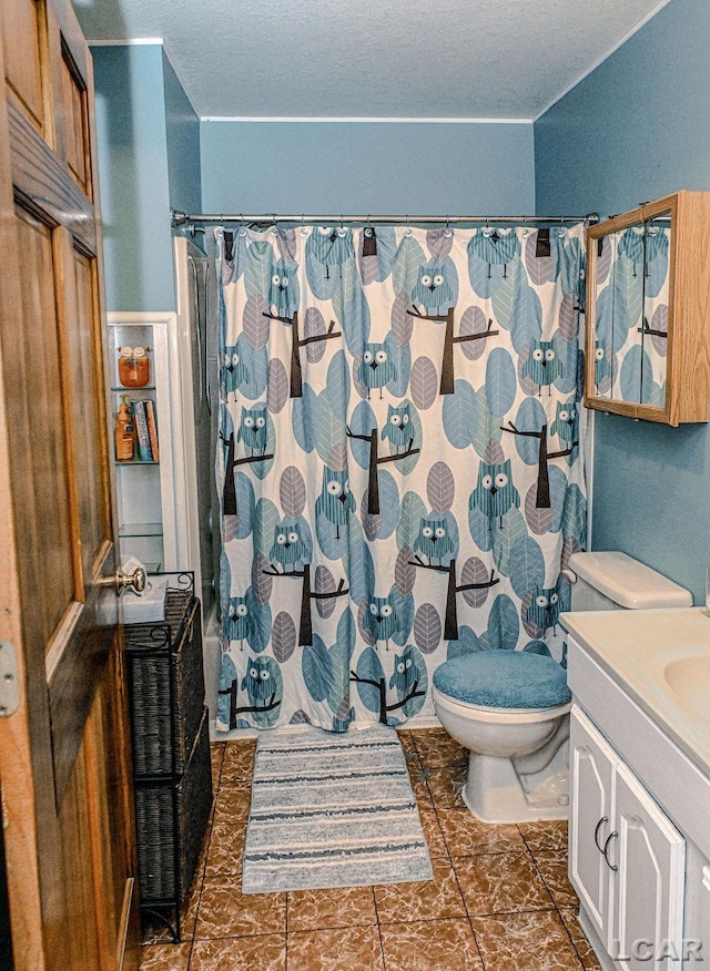 full bathroom with vanity, tile patterned flooring, toilet, a textured ceiling, and shower / tub combo with curtain