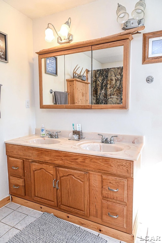 bathroom with vanity and tile patterned floors