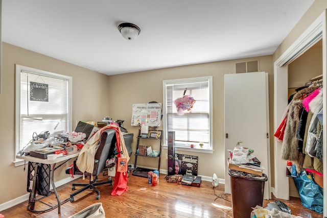 office area featuring hardwood / wood-style floors