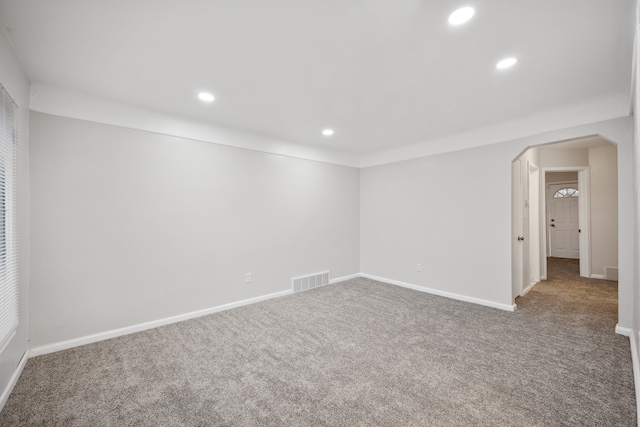 unfurnished room with carpet floors