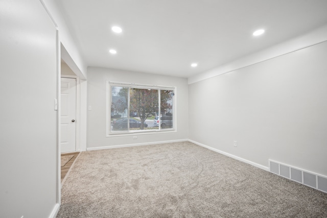 view of carpeted spare room