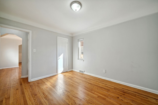 empty room with light wood-type flooring