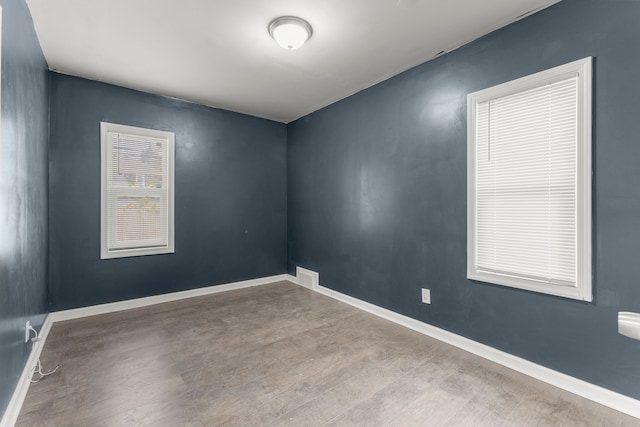 empty room featuring light hardwood / wood-style floors