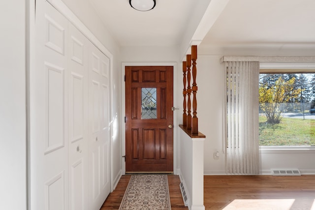 foyer with hardwood / wood-style flooring