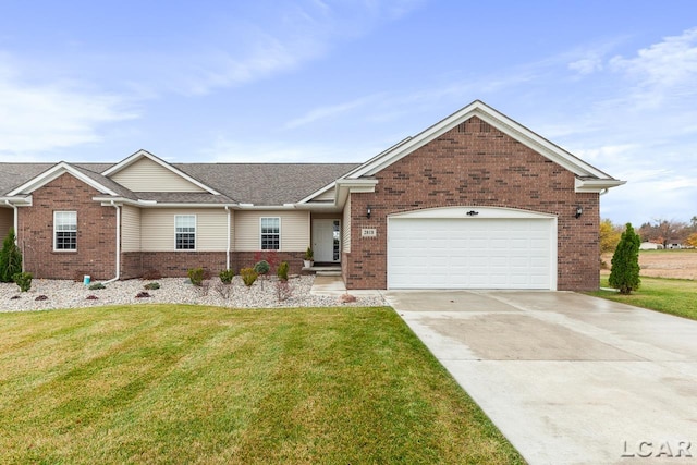 view of front of house with a garage and a front lawn