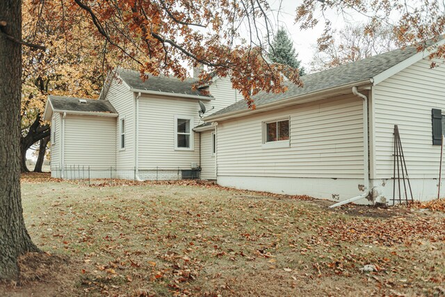 317 Maiden Ln, Saint Joseph, MI 49085 - back of house with a shingled roof