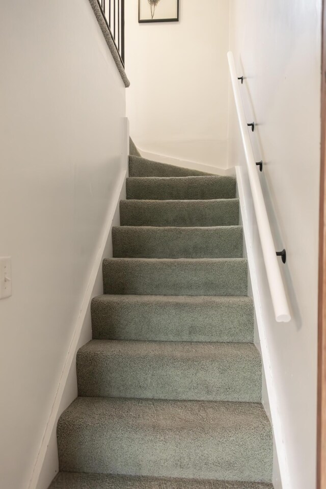 317 Maiden Ln, Saint Joseph, MI 49085 - stairway with carpet floors
