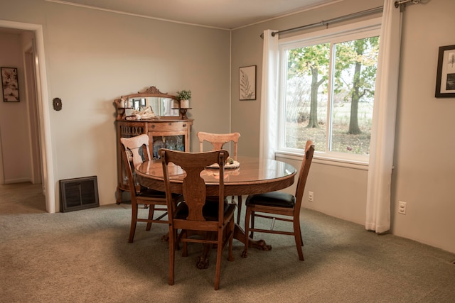 dining space featuring carpet floors